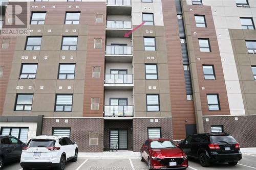 728 Brownstone Unit# 409, Lakeshore, ON - Outdoor With Balcony With Facade