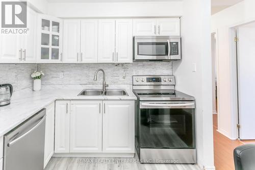 305B - 211 Forum Drive, Mississauga, ON - Indoor Photo Showing Kitchen With Double Sink