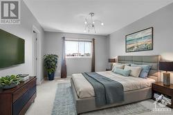 Virtually staged, Naturally Bright Primary Bedroom with Walk-in Closet and a 4 piece Ensuite - 