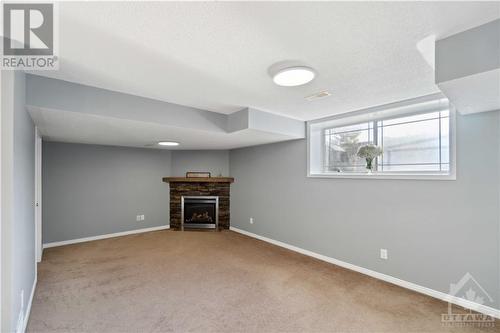 Spacious Basement - 642 Pepperville Crescent, Ottawa, ON - Indoor With Fireplace