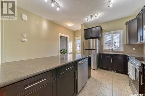 3366 Green Moss Lane, Regina, SK - Indoor Photo Showing Kitchen With Stainless Steel Kitchen With Double Sink