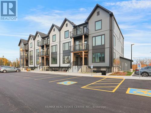 122 - 708 Woolwich Street, Guelph, ON - Outdoor With Facade