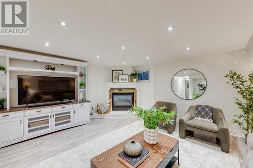 23 - 543 Steeles Avenue W, Toronto, ON - Indoor Photo Showing Living Room With Fireplace