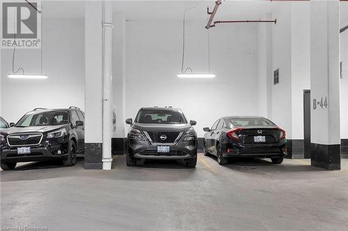 55 Duke Street W Unit# 909, Kitchener, ON - Indoor Photo Showing Garage