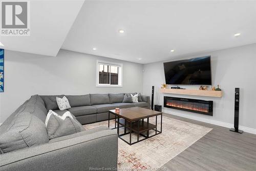 615 Donlon, Lasalle, ON - Indoor Photo Showing Living Room With Fireplace