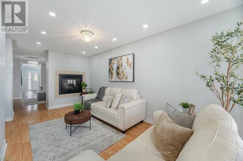 132 Tomabrook Crescent, Brampton, ON - Indoor Photo Showing Living Room With Fireplace