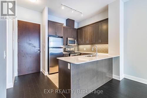 724 - 2480 Prince Michael Drive, Oakville, ON - Indoor Photo Showing Kitchen With Stainless Steel Kitchen