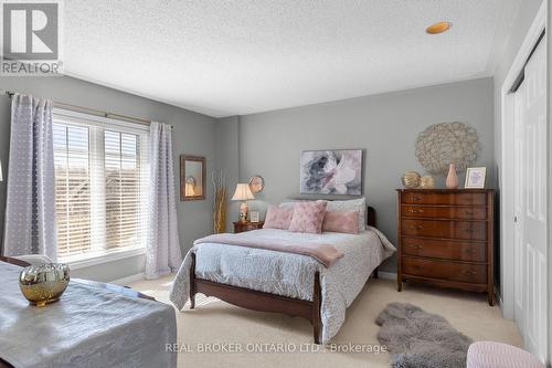 8670 Crayton Court, North Perth, ON - Indoor Photo Showing Bedroom