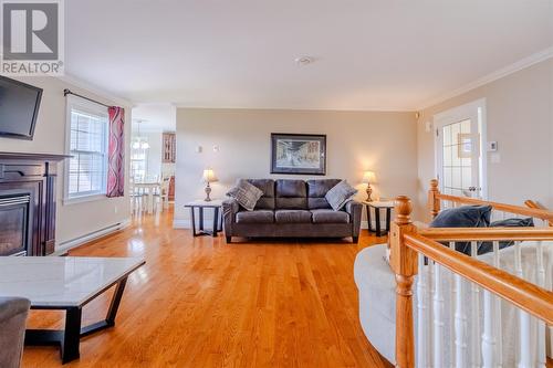 41 Wisemans Lane, Conception Bay South, NL - Indoor Photo Showing Living Room With Fireplace