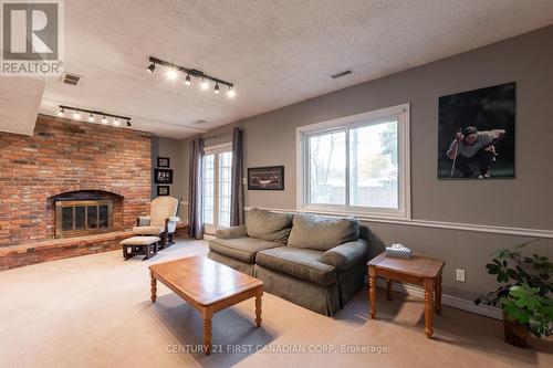 34 Blue Ridge Crescent, London, ON - Indoor Photo Showing Living Room With Fireplace