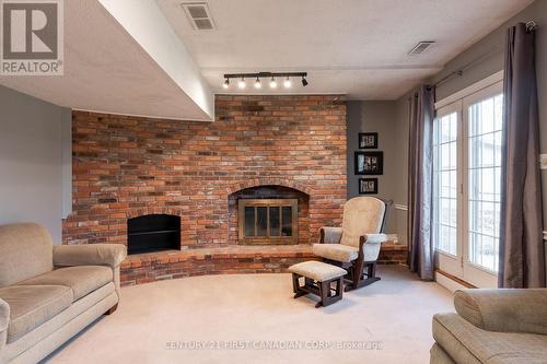 34 Blue Ridge Crescent, London, ON - Indoor Photo Showing Living Room With Fireplace