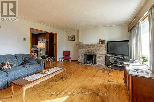 40 Fath Avenue, Aylmer (Ay), ON - Indoor Photo Showing Living Room With Fireplace