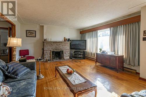 40 Fath Avenue, Aylmer (Ay), ON - Indoor Photo Showing Living Room With Fireplace