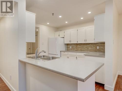 Kitchen - 106 1110 Oscar St, Victoria, BC - Indoor Photo Showing Kitchen With Double Sink