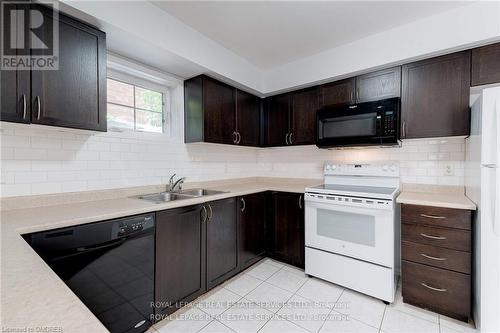 20 - 2460 Post Road, Oakville, ON - Indoor Photo Showing Kitchen With Double Sink