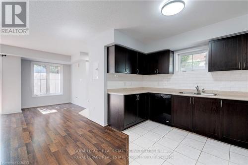 20 - 2460 Post Road, Oakville, ON - Indoor Photo Showing Kitchen With Double Sink