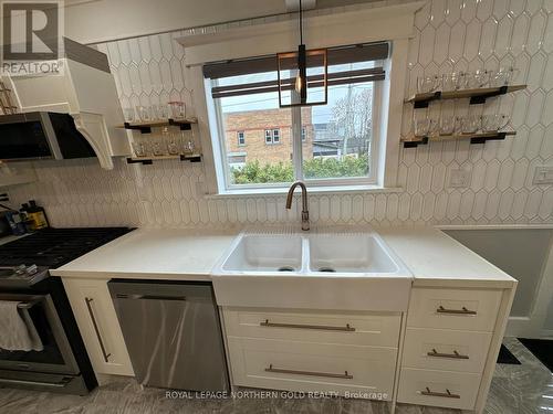 70 Main Street, Kirkland Lake, ON - Indoor Photo Showing Kitchen With Double Sink