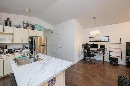 1636 Logan Avenue, Winnipeg, MB - Indoor Photo Showing Kitchen With Double Sink