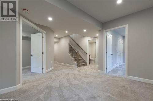 Fully finished basement w/in floor heat *previously built model - 22 Silver Maple Lane, North Bay, ON - Indoor Photo Showing Other Room