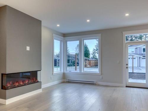 1786 15Th St, Courtenay, BC - Indoor With Fireplace