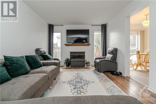 183 Markland Crescent, Ottawa, ON - Indoor Photo Showing Living Room With Fireplace