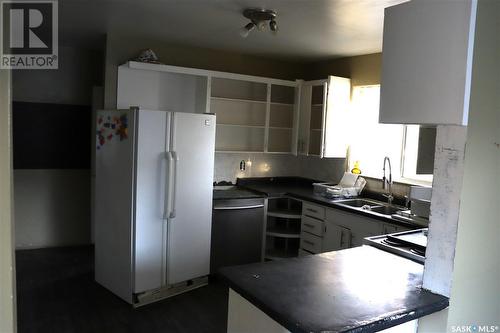 353 25Th Street W, Prince Albert, SK - Indoor Photo Showing Kitchen With Double Sink