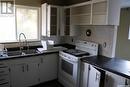 353 25Th Street W, Prince Albert, SK  - Indoor Photo Showing Kitchen With Double Sink 