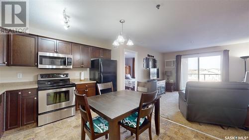 305 E 1300 Stockton Street N, Regina, SK - Indoor Photo Showing Kitchen With Stainless Steel Kitchen