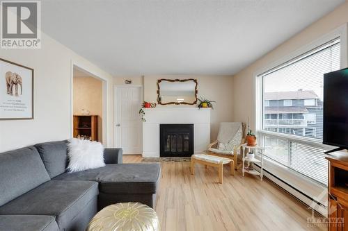 794 St Andre Drive Unit#62B, Ottawa, ON - Indoor Photo Showing Living Room With Fireplace