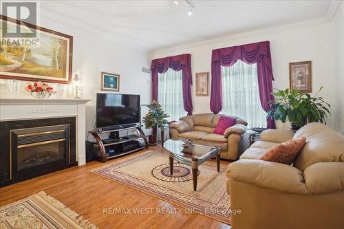 215 - 2085 Amherst Heights Drive, Burlington, ON - Indoor Photo Showing Living Room With Fireplace