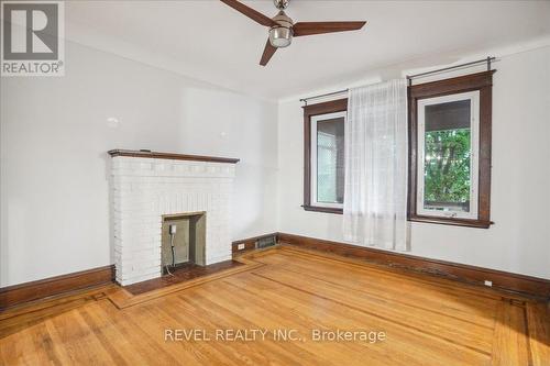 16 Senator Avenue, Hamilton, ON - Indoor Photo Showing Other Room With Fireplace