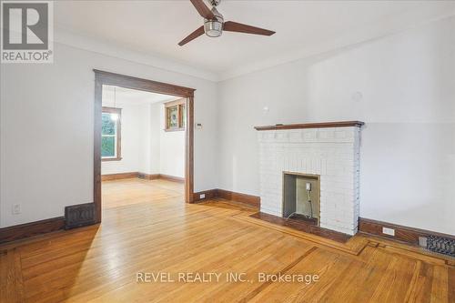 16 Senator Avenue, Hamilton, ON - Indoor Photo Showing Other Room With Fireplace