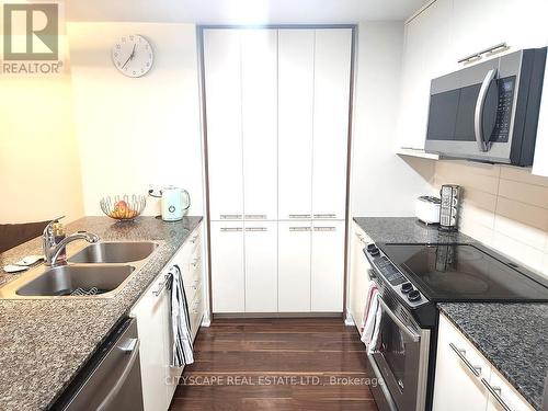 104 - 5 Valhalla Inn Road, Toronto, ON - Indoor Photo Showing Kitchen With Double Sink With Upgraded Kitchen