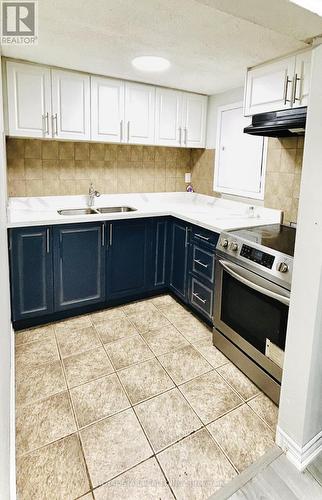 7745 Priory Crescent, Mississauga, ON - Indoor Photo Showing Kitchen With Double Sink