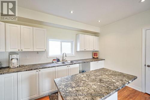 4973 Old Brock Road, Pickering, ON - Indoor Photo Showing Kitchen With Double Sink