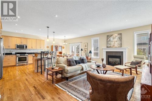 53 Cinnabar Way, Ottawa, ON - Indoor Photo Showing Living Room With Fireplace