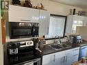 619 1St Street E, Meadow Lake, SK  - Indoor Photo Showing Kitchen With Stainless Steel Kitchen With Double Sink 