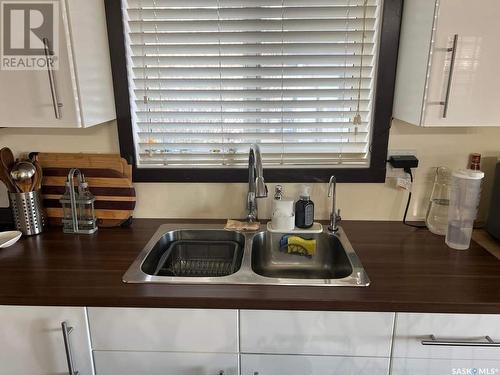 619 1St Street E, Meadow Lake, SK - Indoor Photo Showing Kitchen With Double Sink