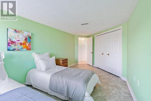 101 - 9 Pine Street, Lambton Shores (Grand Bend), ON - Indoor Photo Showing Bedroom