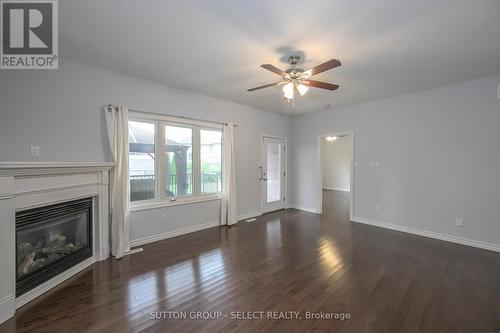 living room without staging - 966 Moy Crescent, London, ON - Indoor With Fireplace