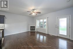 open concept living room leading out to deck - 