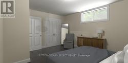 Virtually Staged - lower level bedroom - 