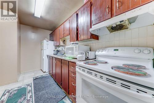 505 - 4060 Lawrence Avenue E, Toronto, ON - Indoor Photo Showing Kitchen