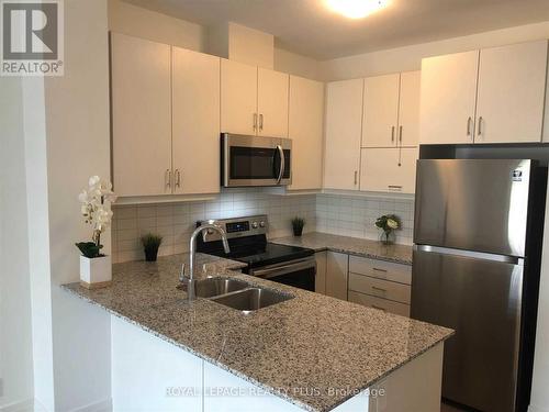 238 - 102 Grovewood Common Circle, Oakville, ON - Indoor Photo Showing Kitchen With Stainless Steel Kitchen With Double Sink With Upgraded Kitchen