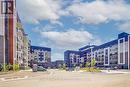 238 - 102 Grovewood Common Circle, Oakville, ON  - Outdoor With Facade 