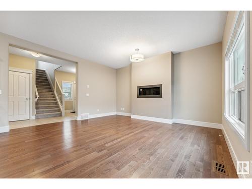 3915 Agar Co Sw, Edmonton, AB - Indoor Photo Showing Living Room With Fireplace