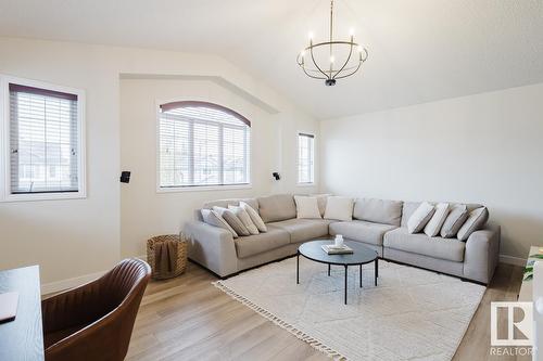 420 84 St Sw, Edmonton, AB - Indoor Photo Showing Living Room