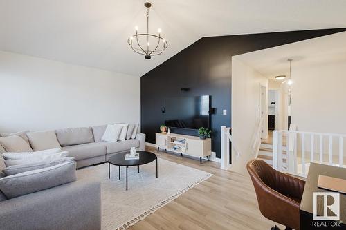 420 84 St Sw, Edmonton, AB - Indoor Photo Showing Living Room