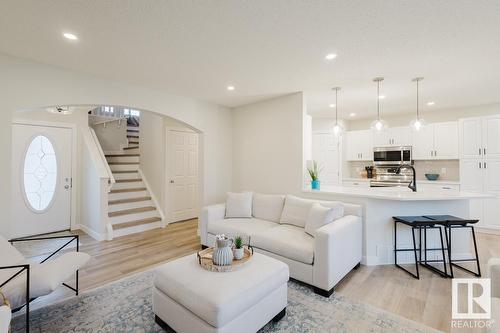 420 84 St Sw, Edmonton, AB - Indoor Photo Showing Living Room