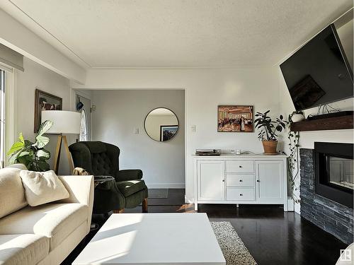 9535 148 St Nw, Edmonton, AB - Indoor Photo Showing Living Room With Fireplace